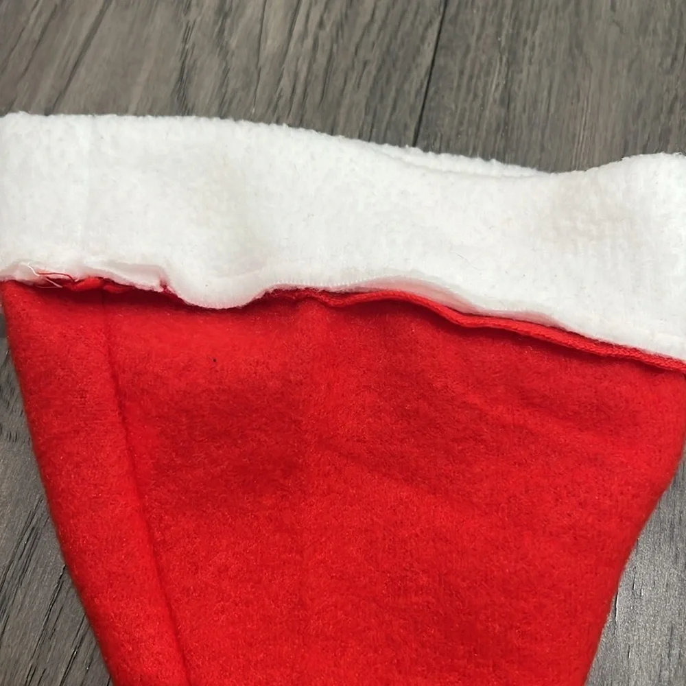 NWOT infant Santa hat with matching sock booties with pom-poms